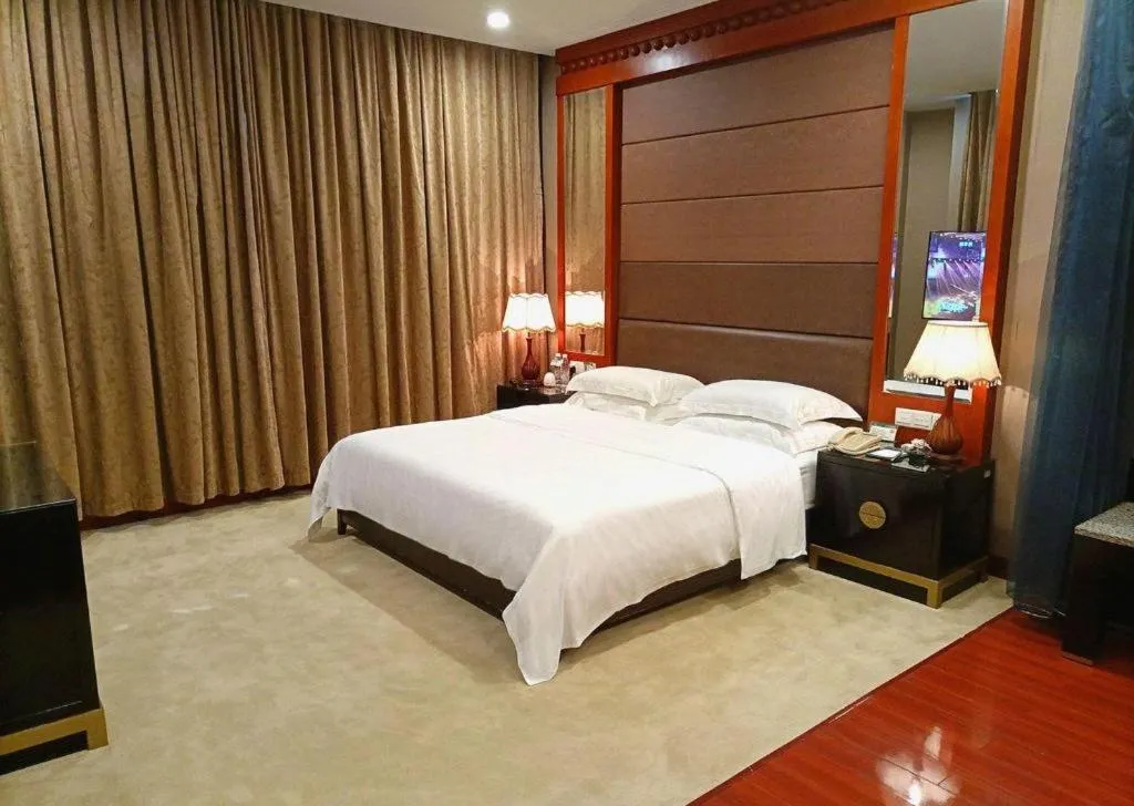 Bed in OSOTTO RECREATION HOTEL