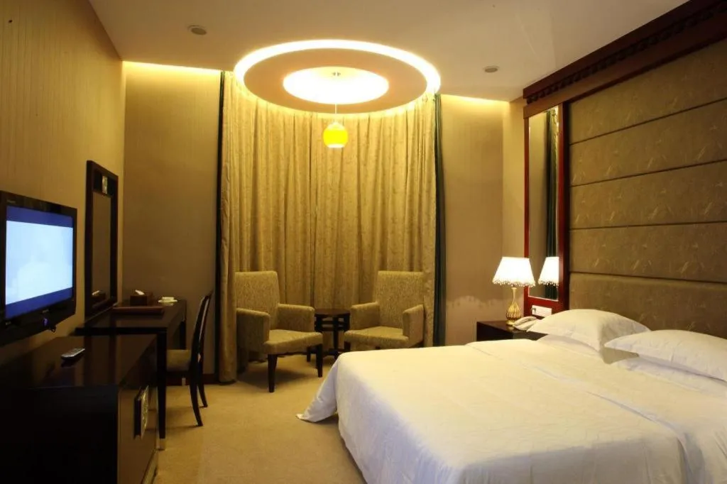 Bed in OSOTTO RECREATION HOTEL