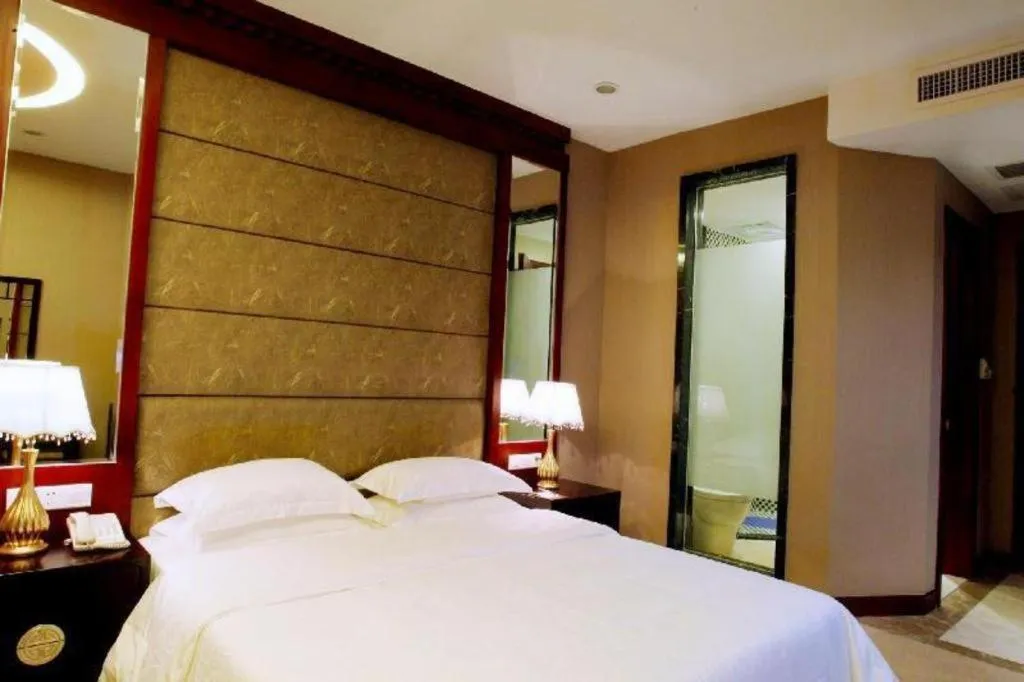 Bed in OSOTTO RECREATION HOTEL