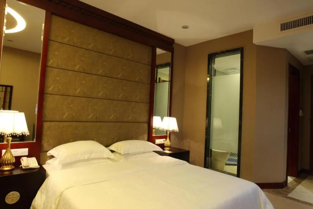 Bed in OSOTTO RECREATION HOTEL