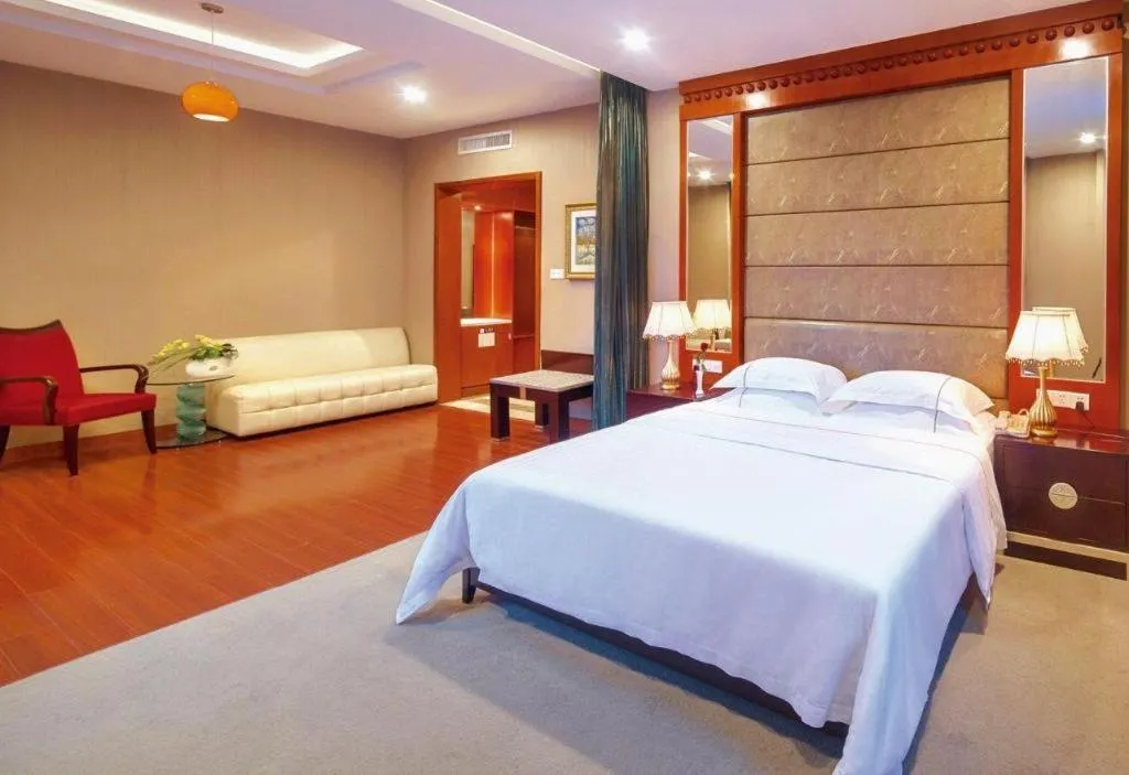 Bed in OSOTTO RECREATION HOTEL