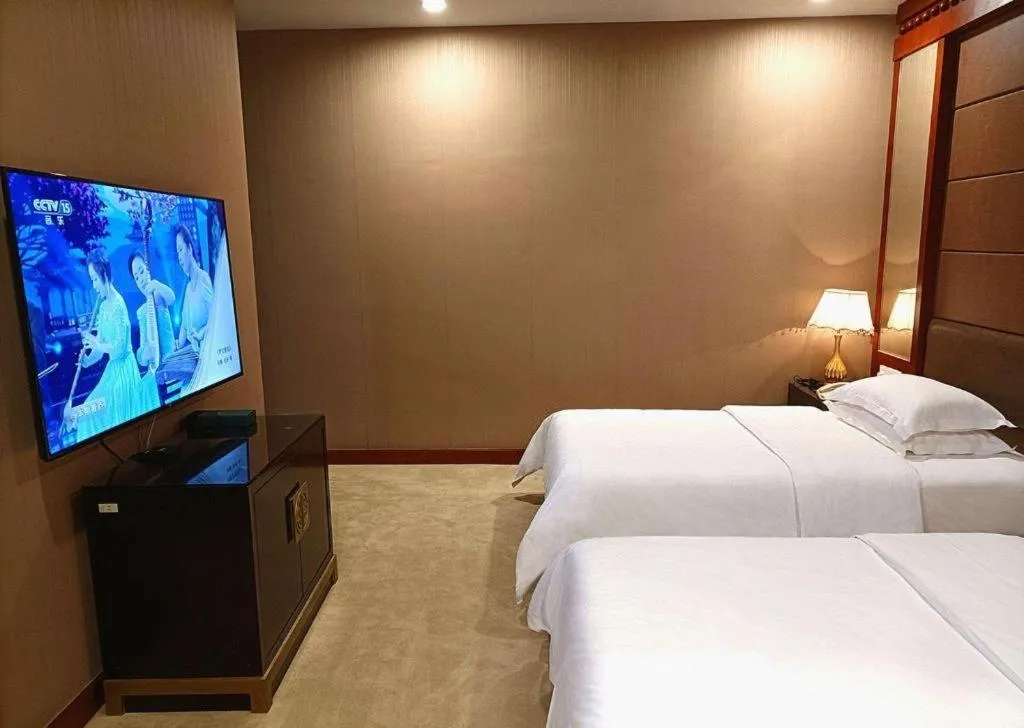 Bed in OSOTTO RECREATION HOTEL