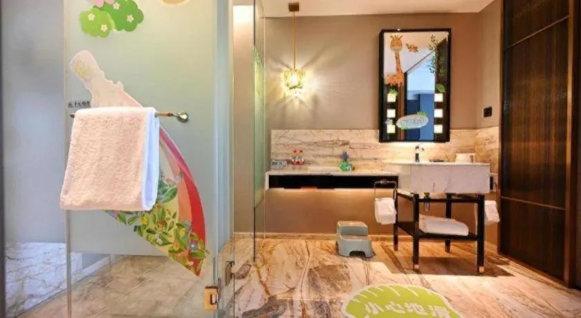 Bed in Grand New Century Hotel Yixing