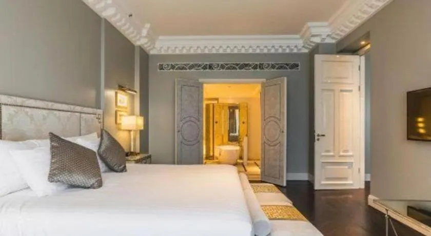 Bed in Grand New Century Hotel Yixing