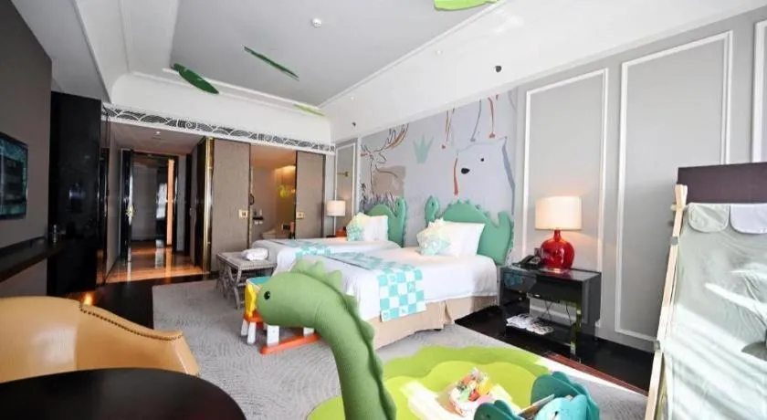 Bed in Grand New Century Hotel Yixing