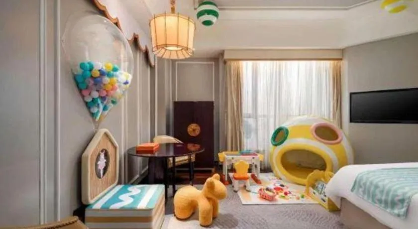 Bed in Grand New Century Hotel Yixing