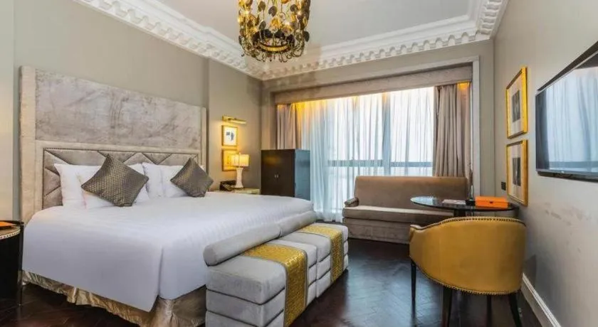 Bed in Grand New Century Hotel Yixing