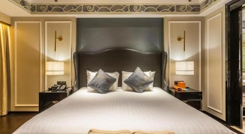 Bed in Grand New Century Hotel Yixing