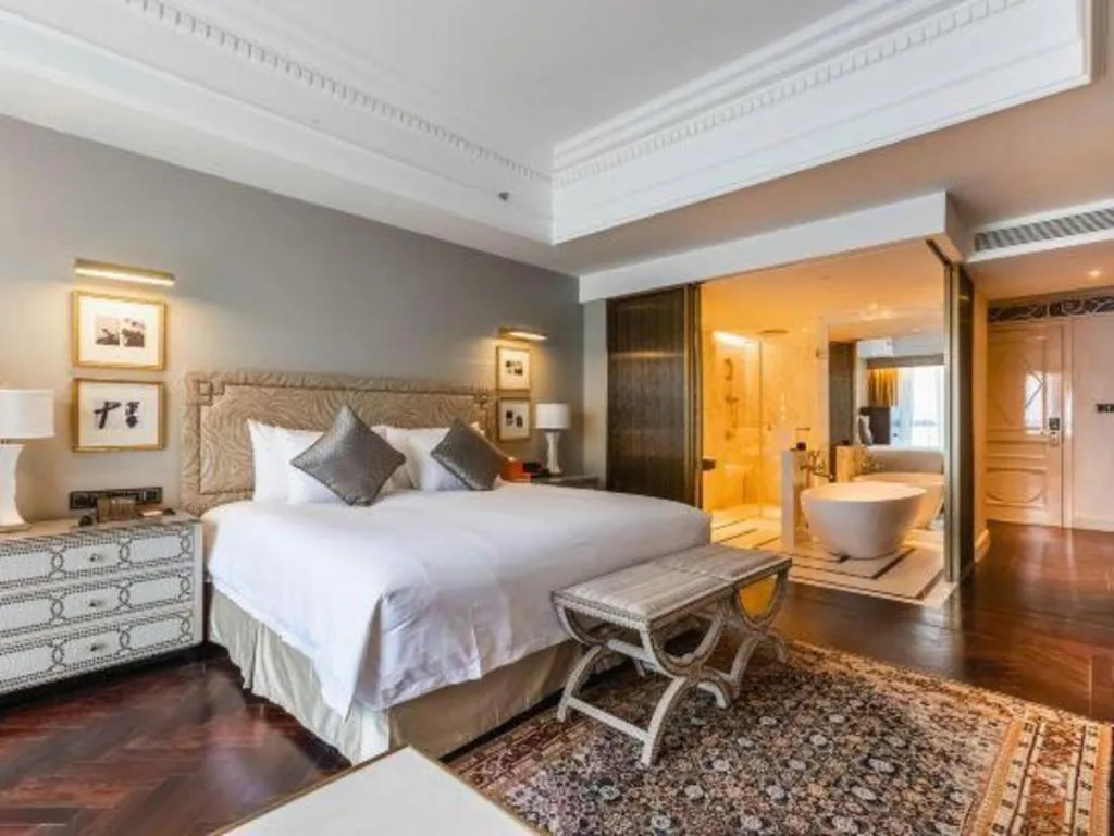 Bed in Grand New Century Hotel Yixing