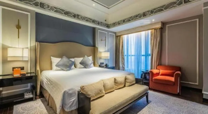 Bed in Grand New Century Hotel Yixing