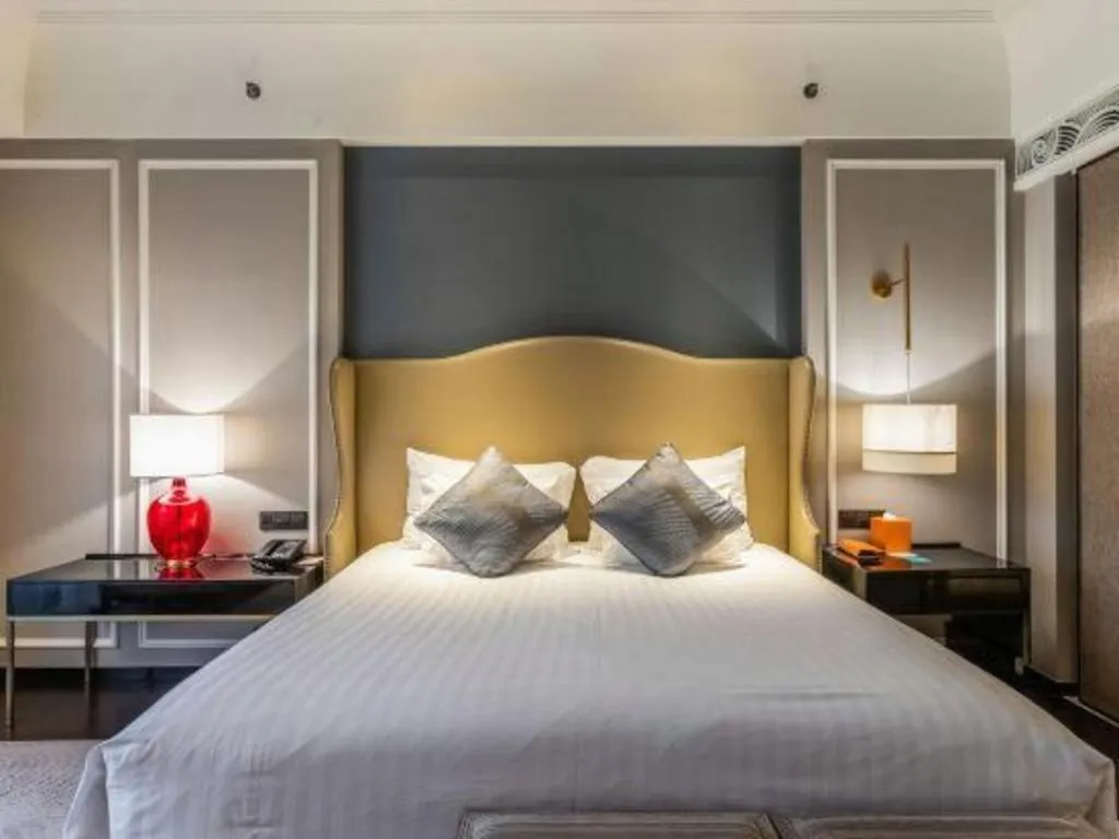 Bed in Grand New Century Hotel Yixing