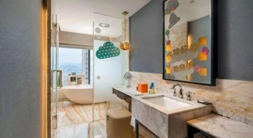 Bed in Grand New Century Hotel Yixing