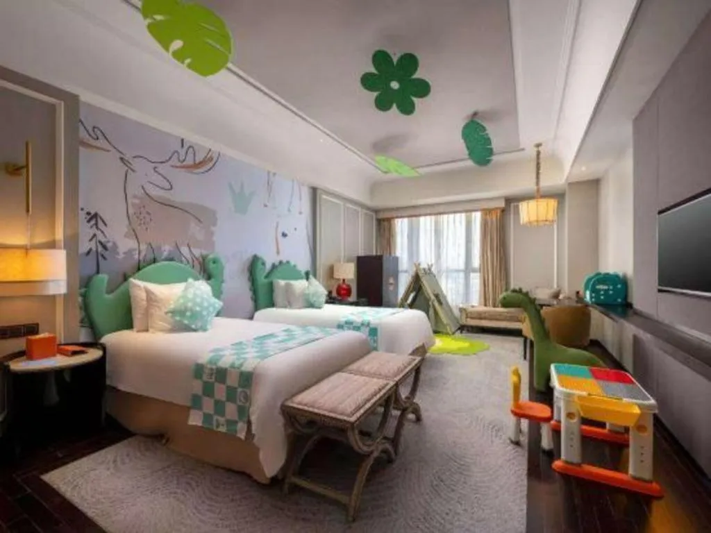 Bed in Grand New Century Hotel Yixing