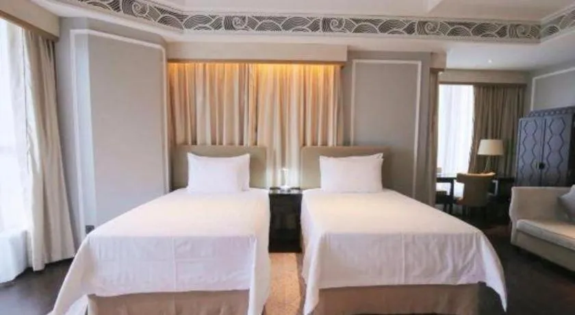 Bed in Grand New Century Hotel Yixing