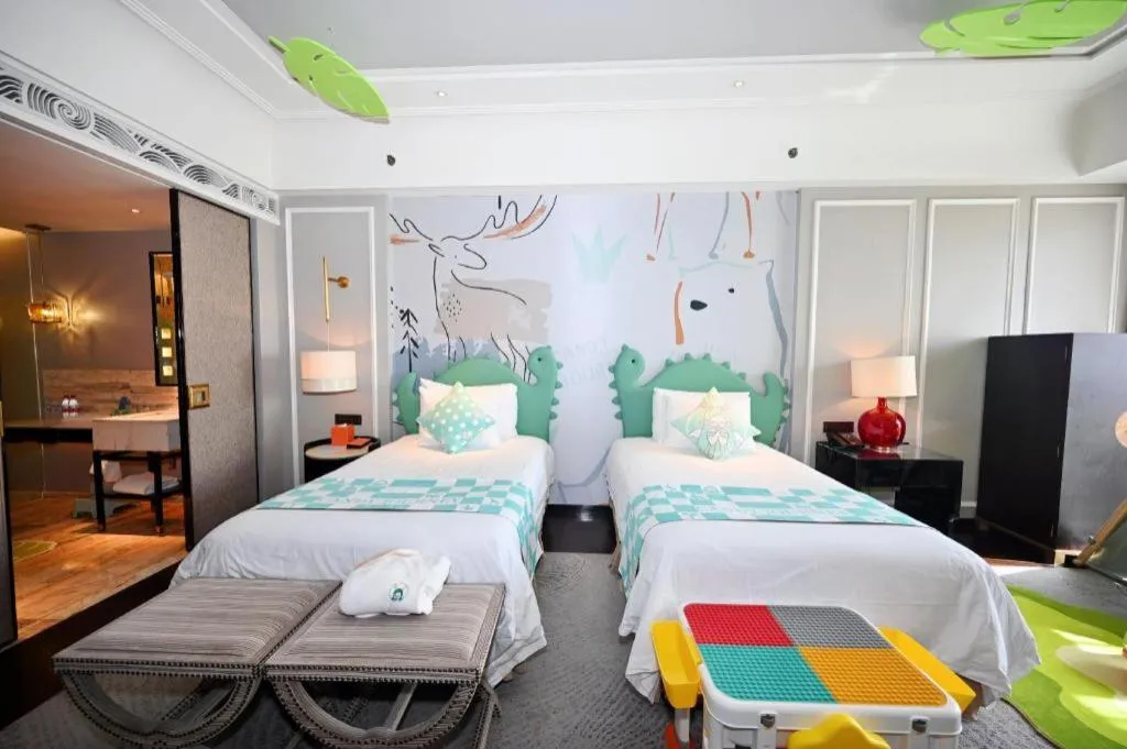 Bed in Grand New Century Hotel Yixing