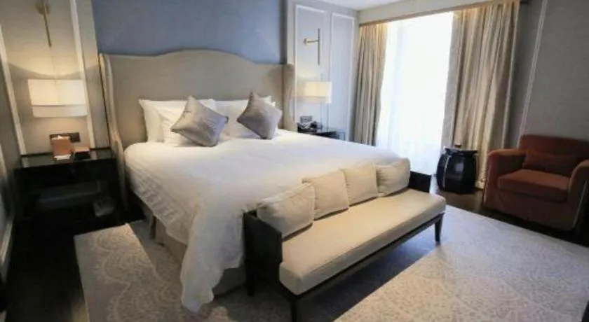 Bed in Grand New Century Hotel Yixing