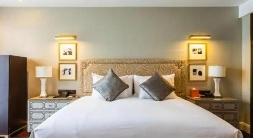 Bed in Grand New Century Hotel Yixing