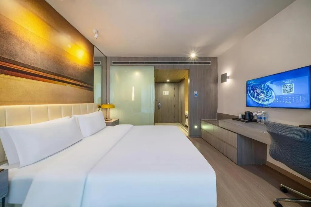 Bed in Jinjiang Metropolo Hotel Hangzhou Xiasha Jinsha Lake