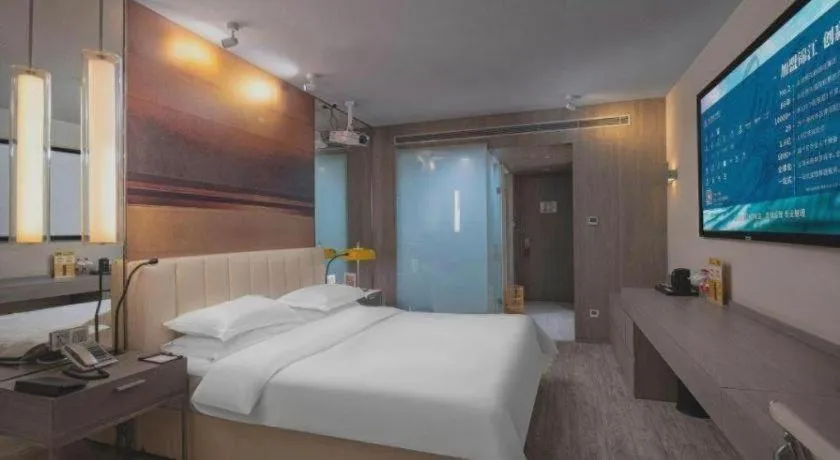 Bed in Jinjiang Metropolo Hotel Hangzhou Xiasha Jinsha Lake