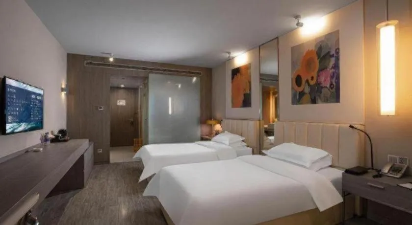 Bed in Jinjiang Metropolo Hotel Hangzhou Xiasha Jinsha Lake