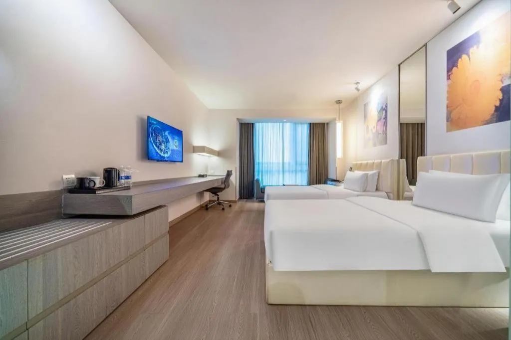 Bed in Jinjiang Metropolo Hotel Hangzhou Xiasha Jinsha Lake