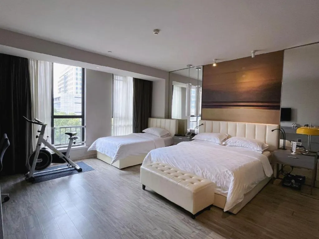 Bed in Jinjiang Metropolo Hotel Hangzhou Xiasha Jinsha Lake