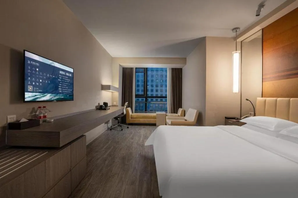 Bed in Jinjiang Metropolo Hotel Hangzhou Xiasha Jinsha Lake