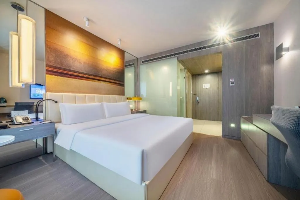 Bed in Jinjiang Metropolo Hotel Hangzhou Xiasha Jinsha Lake