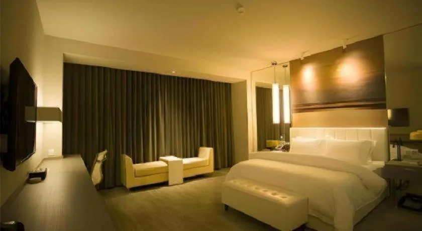 Bed in Jinjiang Metropolo Hotel Hangzhou Xiasha Jinsha Lake