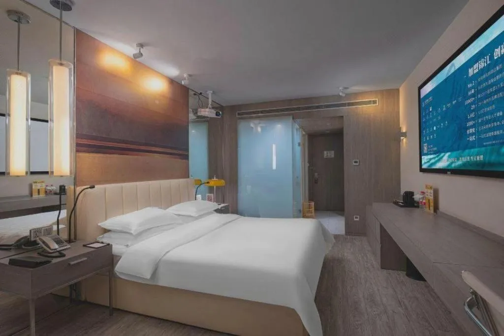 Bed in Jinjiang Metropolo Hotel Hangzhou Xiasha Jinsha Lake