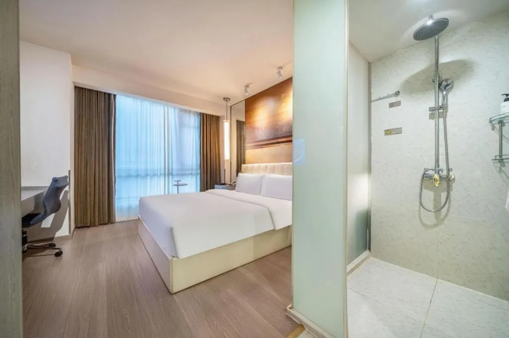 Bed in Jinjiang Metropolo Hotel Hangzhou Xiasha Jinsha Lake