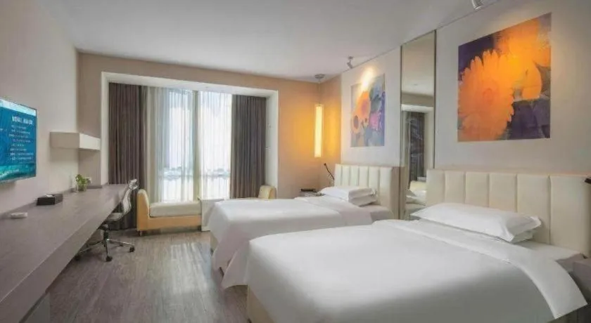 Bed in Jinjiang Metropolo Hotel Hangzhou Xiasha Jinsha Lake