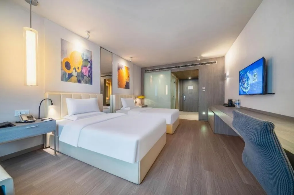 Bed in Jinjiang Metropolo Hotel Hangzhou Xiasha Jinsha Lake