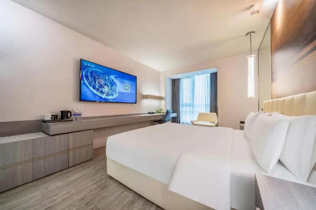 Bed in Jinjiang Metropolo Hotel Hangzhou Xiasha Jinsha Lake