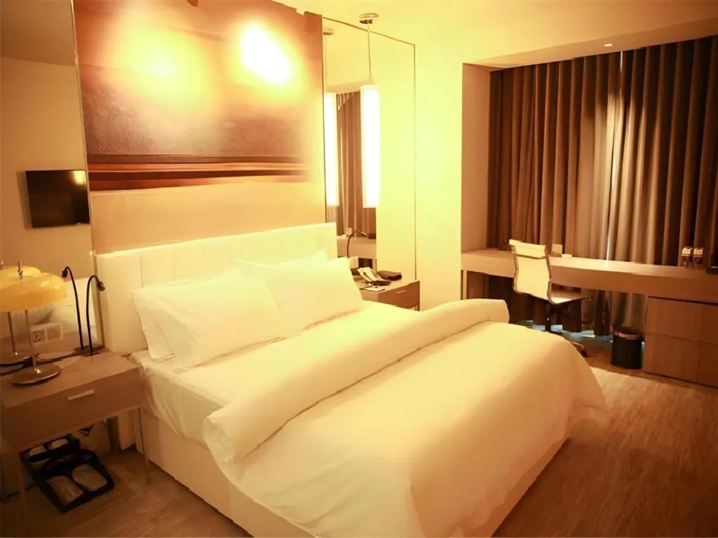 Bed in Jinjiang Metropolo Hotel Hangzhou Xiasha Jinsha Lake