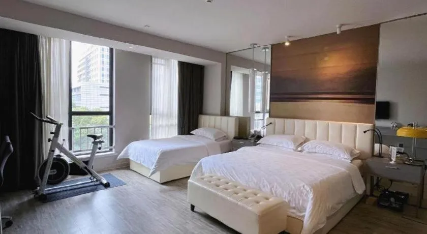 Bed in Jinjiang Metropolo Hotel Hangzhou Xiasha Jinsha Lake