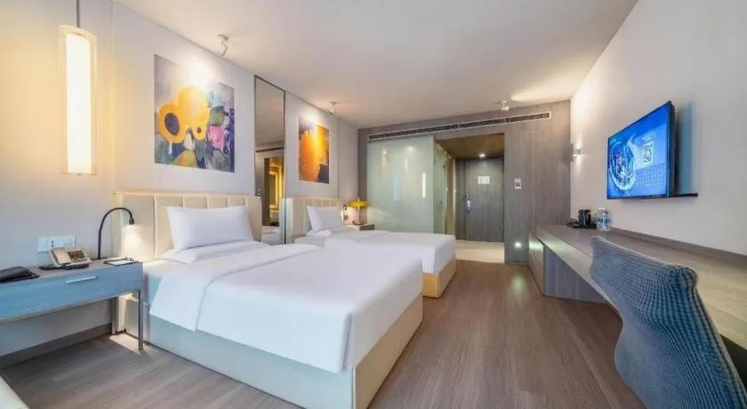 Bed in Jinjiang Metropolo Hotel Hangzhou Xiasha Jinsha Lake