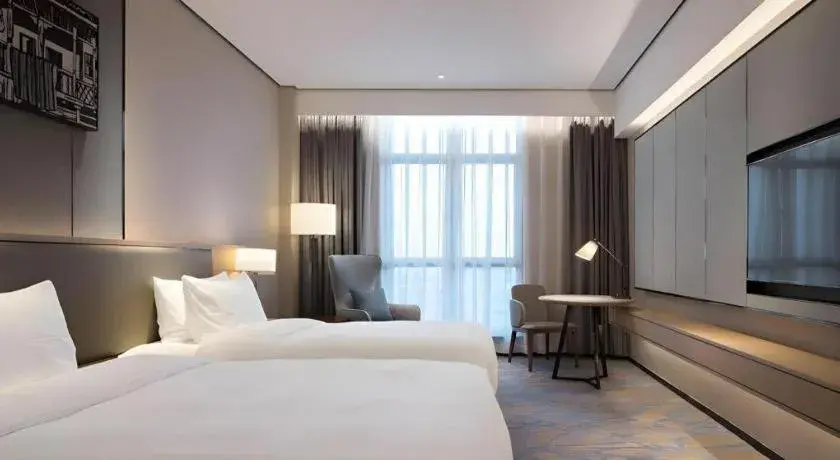 Bed in Zhuhai Tangyi Hotel Bed in Zhuhai Tangyi Hotel