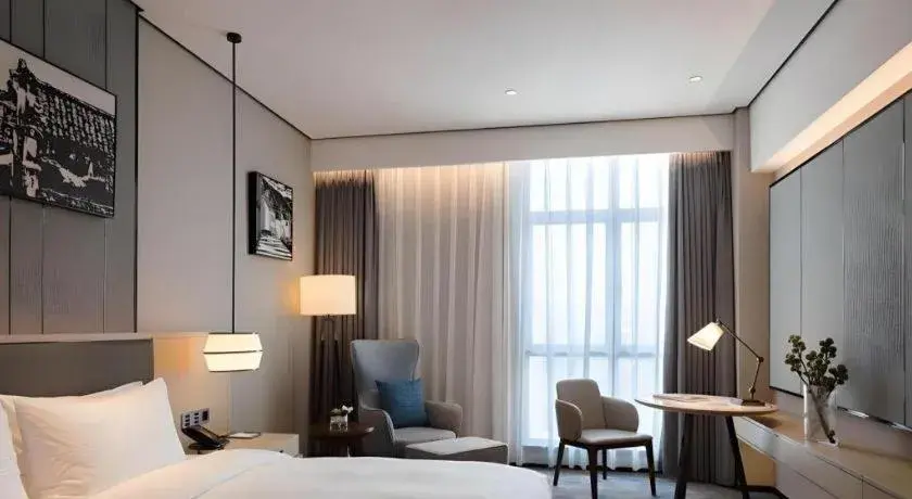 Bed in Zhuhai Tangyi Hotel Bed in Zhuhai Tangyi Hotel