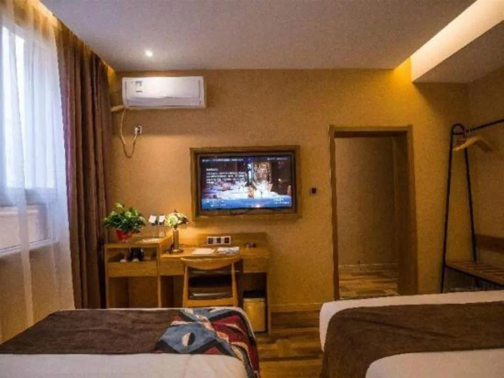 Bed in James Joyce Coffetel·Kaifeng Drum Tower