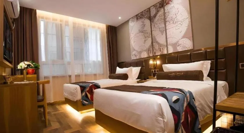 Bed in James Joyce Coffetel·Kaifeng Drum Tower