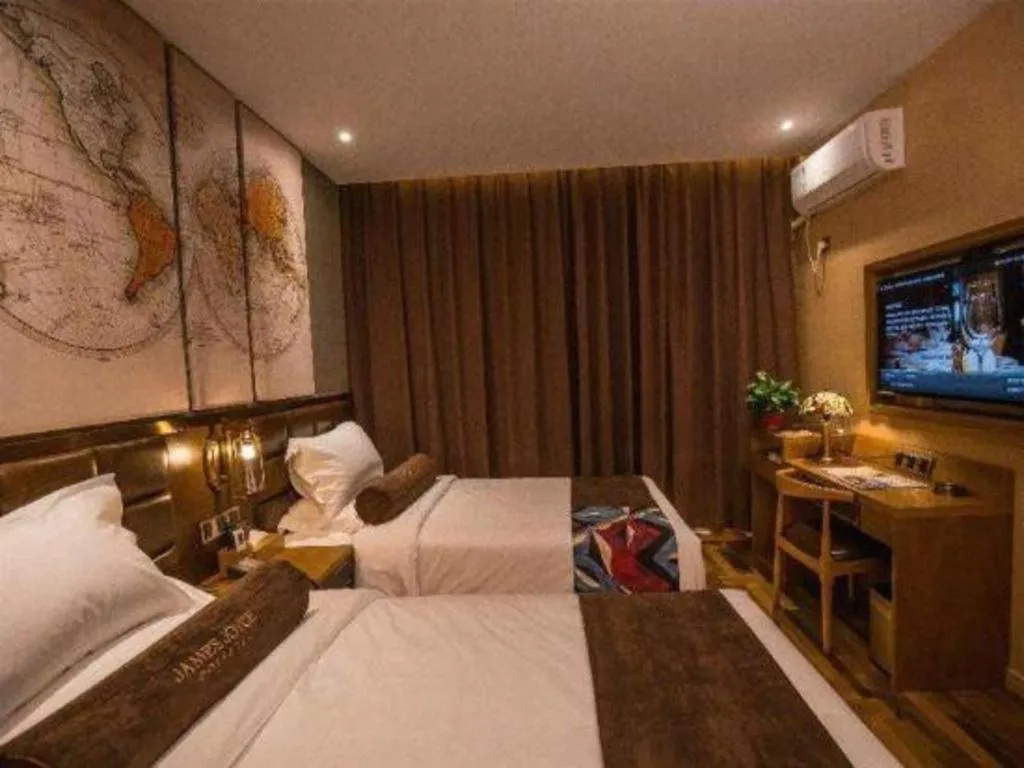 Bed in James Joyce Coffetel·Kaifeng Drum Tower