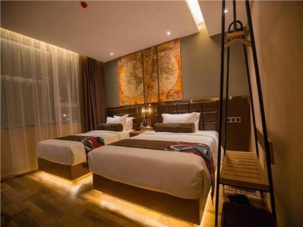 Bed in James Joyce Coffetel·Kaifeng Drum Tower