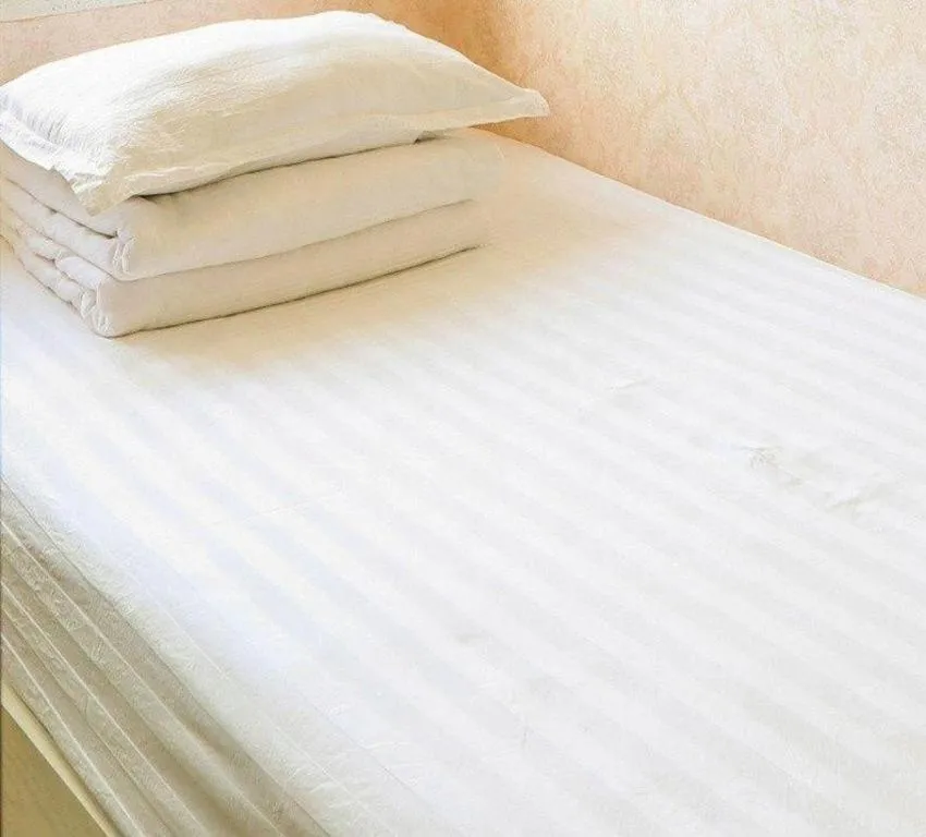 Bed in Jinjiang Inn Style Tianjin Wuqing Traditional Chinese Medical Hospital