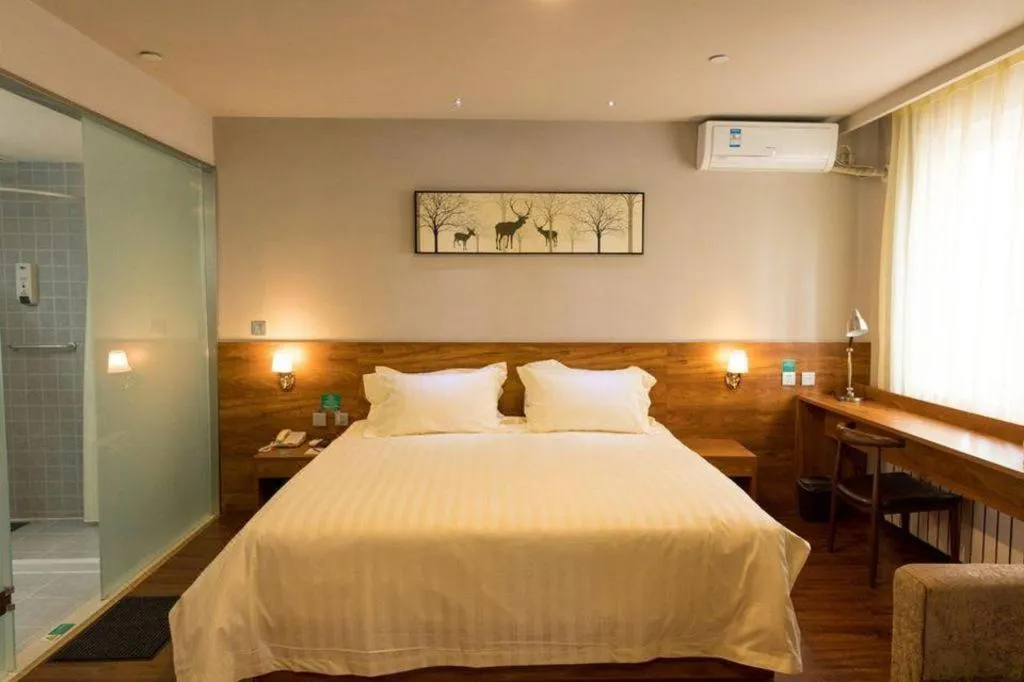 Bed in Jinjiang Inn Style Tianjin Wuqing Traditional Chinese Medical Hospital