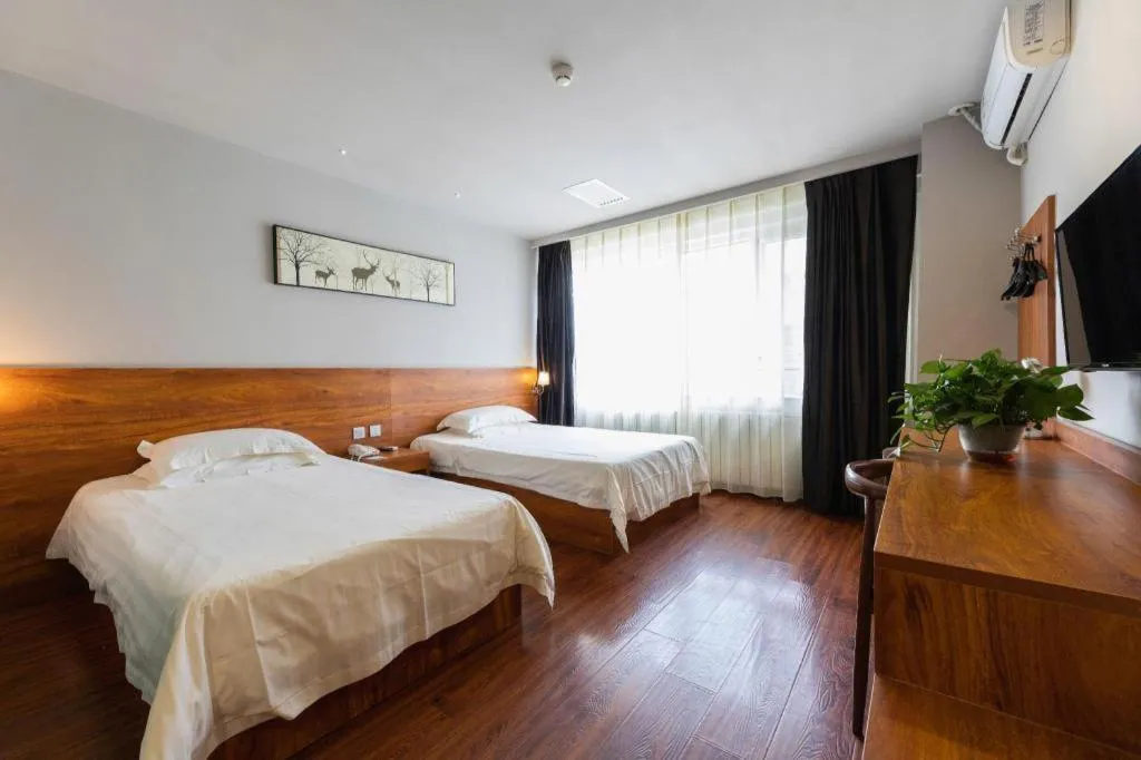 Bed in Jinjiang Inn Style Tianjin Wuqing Traditional Chinese Medical Hospital