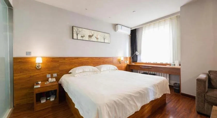 Bed in Jinjiang Inn Style Tianjin Wuqing Traditional Chinese Medical Hospital
