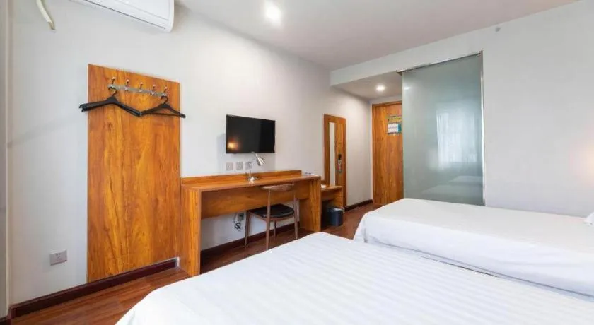 Bed in Jinjiang Inn Style Tianjin Wuqing Traditional Chinese Medical Hospital