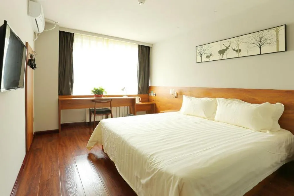 Bed in Jinjiang Inn Style Tianjin Wuqing Traditional Chinese Medical Hospital