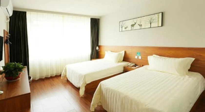 Bed in Jinjiang Inn Style Tianjin Wuqing Traditional Chinese Medical Hospital